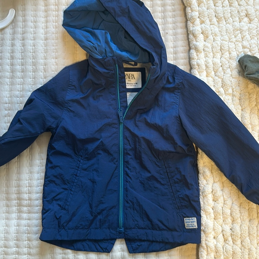 Navy rain jacket, baby size 12 to 18 months